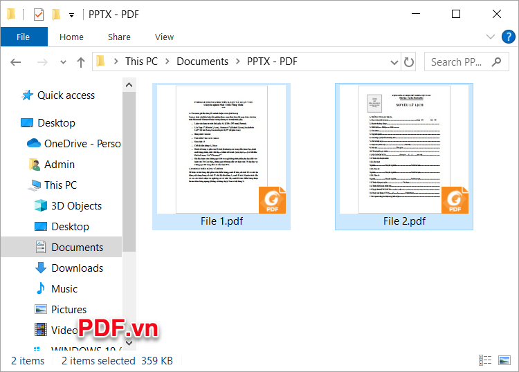 Mở lần lượt 2 file PDF trên màn hình máy tính